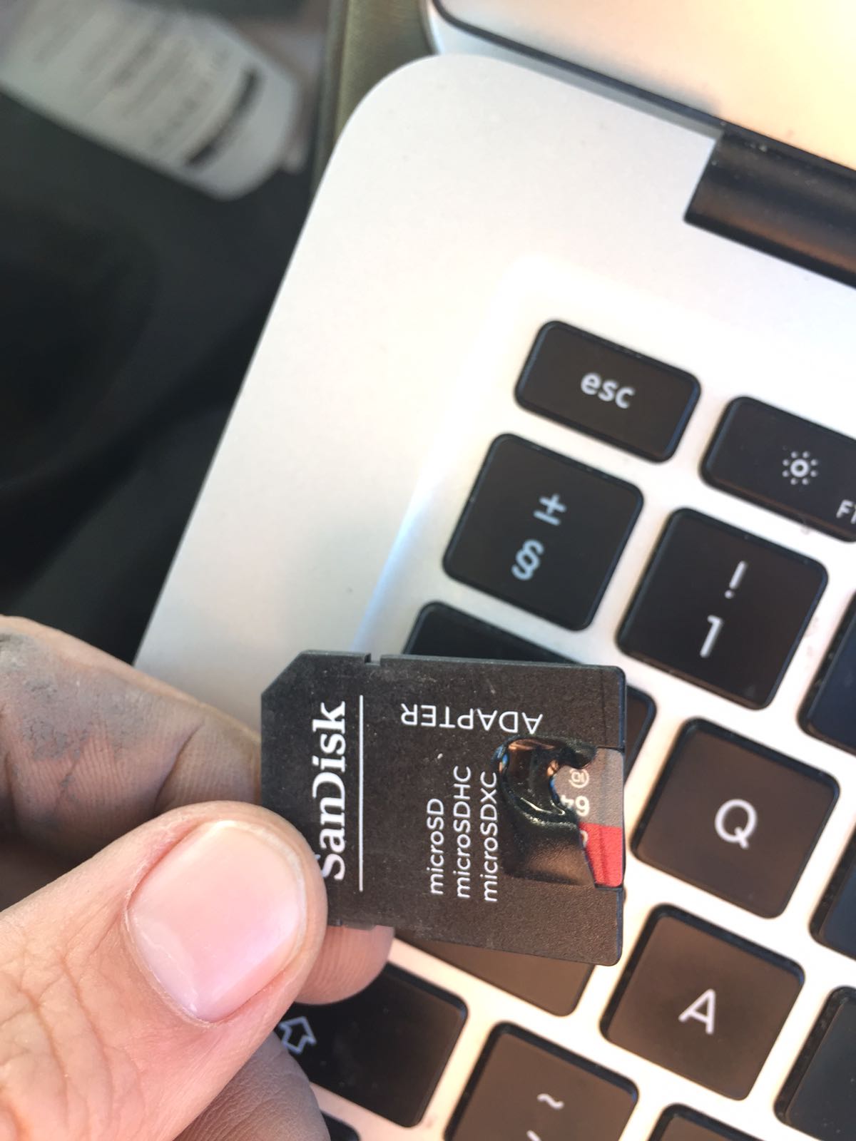 Micro SD card adapter that travels inside your MacBook's SD card